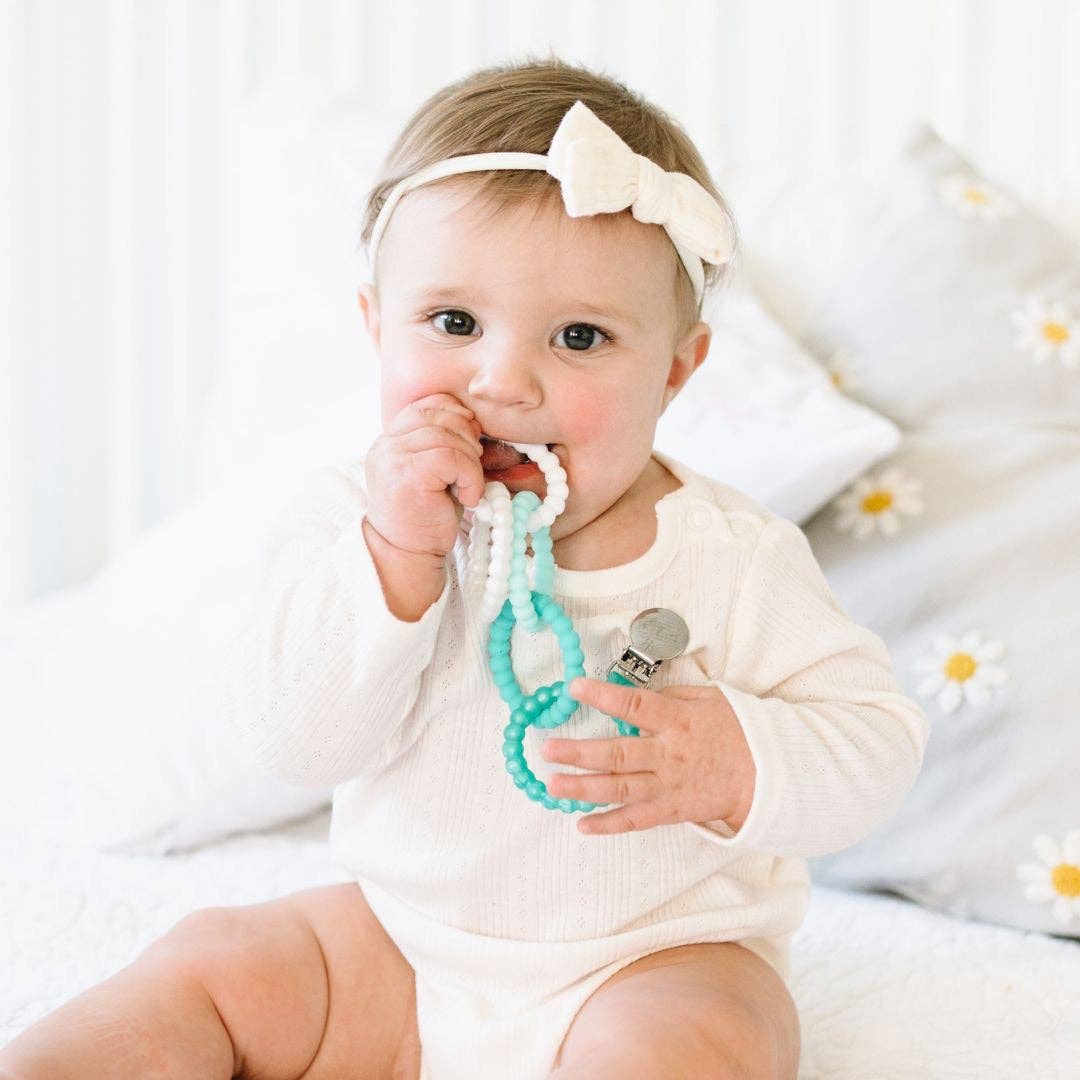 Cutie Clinks – Attachable Teether for Developmental Support and Gum Relief