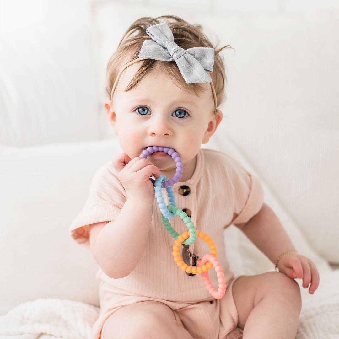 Cutie Clinks – Attachable Teether for Developmental Support and Gum Relief